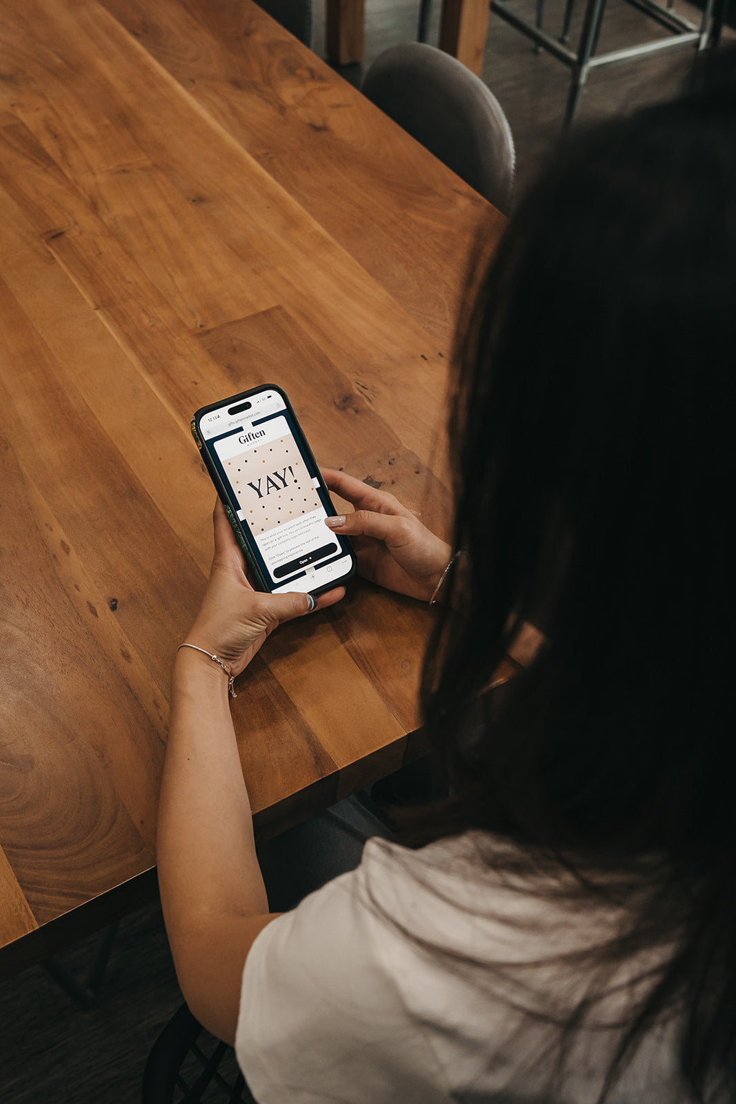 Recipient viewing their Giften Market digital gift page on a phone