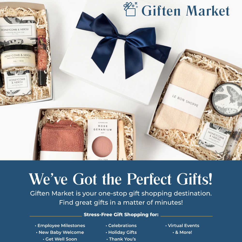Premium gift boxes with candles, soaps, snacks, and cozy socks in white packaging and navy ribbon