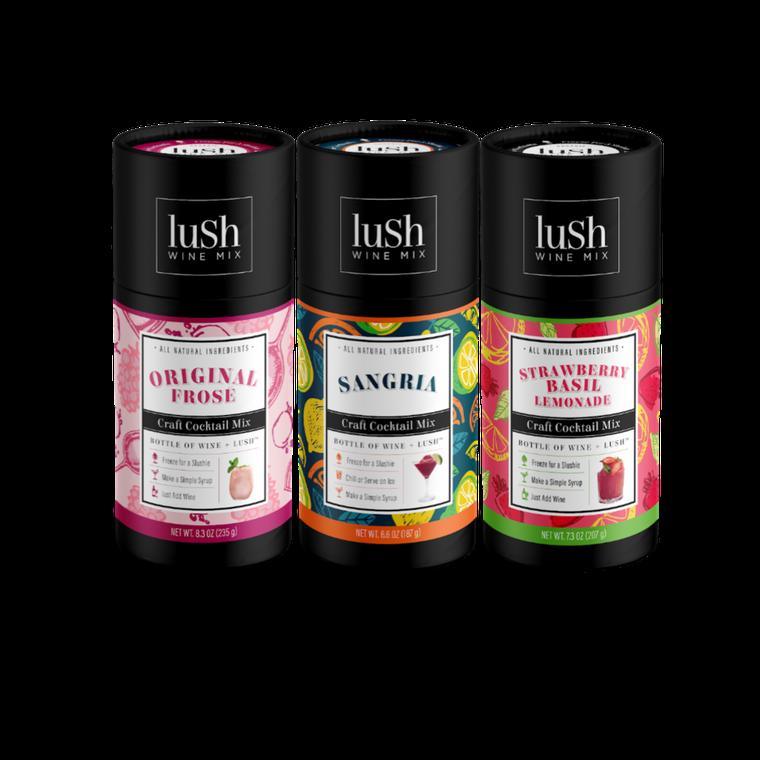 Three craft cocktail mix canisters for wine, flavors include frosé, sangria, and strawberry basil lemonade.