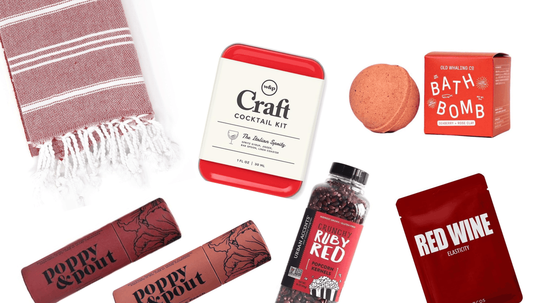 Premium gift box items including red towel, cocktail kit, bath bomb, popcorn, lip balm, and face mask