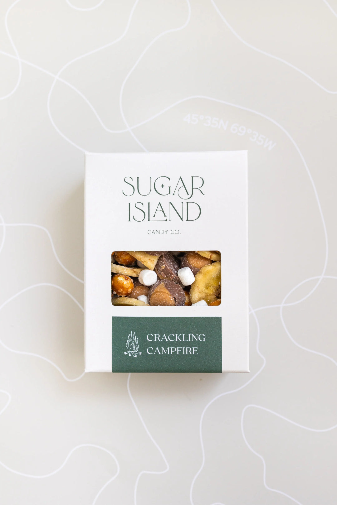 Crackling Campfire Candy Mix in a white Sugar Island box with a green label and a window showing the mix