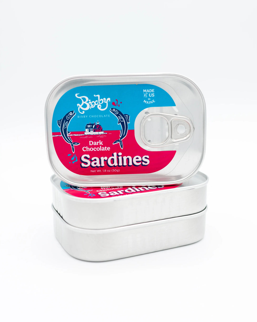 Two stacked Bixby Dark Chocolate Sardines tins with a pink and turquoise label