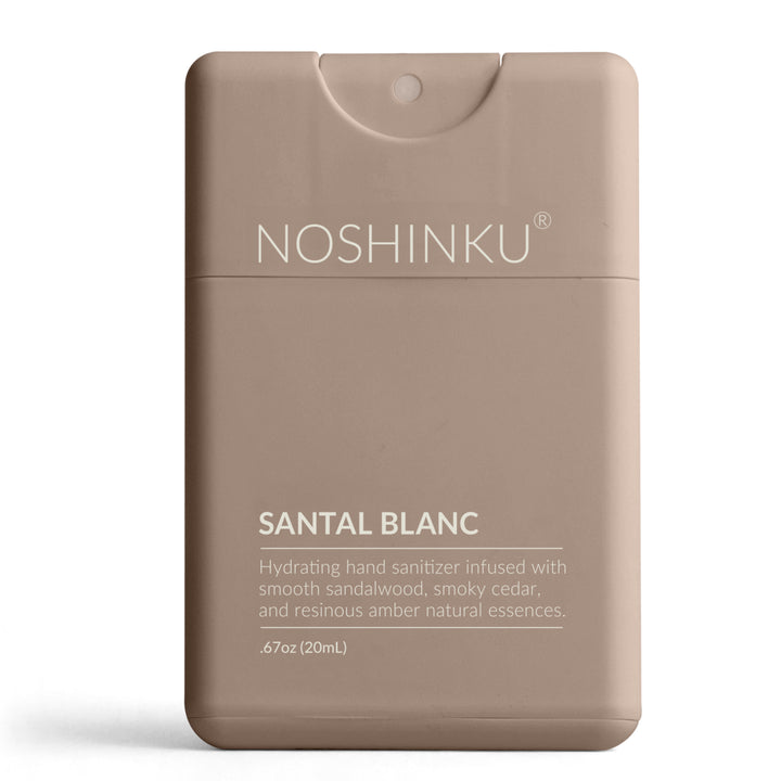 Taupe Noshinku Santal Blanc pocket sanitizer standing on a white background