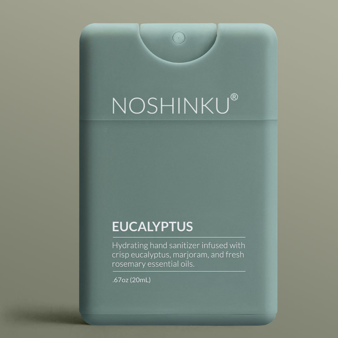 Sage green Noshinku Eucalyptus pocket hand sanitizer on a sage background