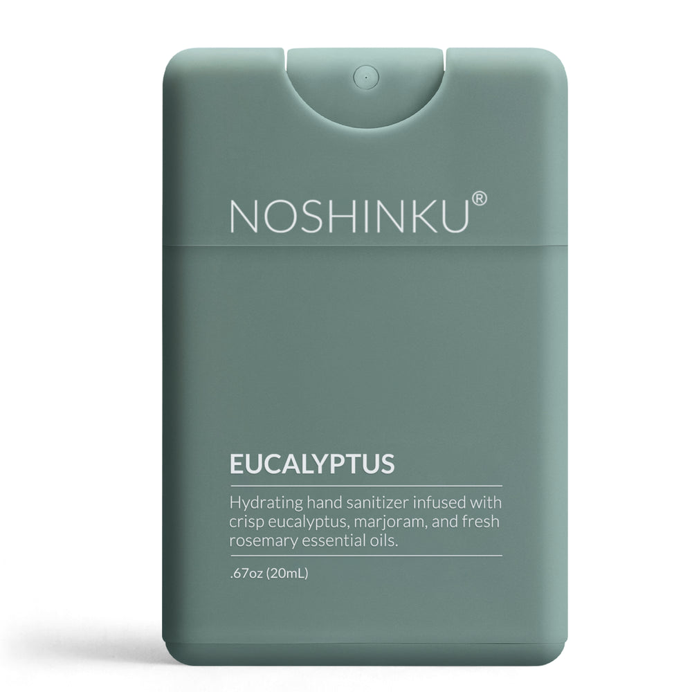 Sage green Noshinku Eucalyptus pocket sanitizer standing on a white background