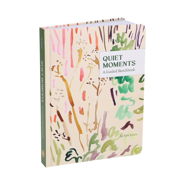 Quiet Moments sketchbook shown at an angle to show the green spine