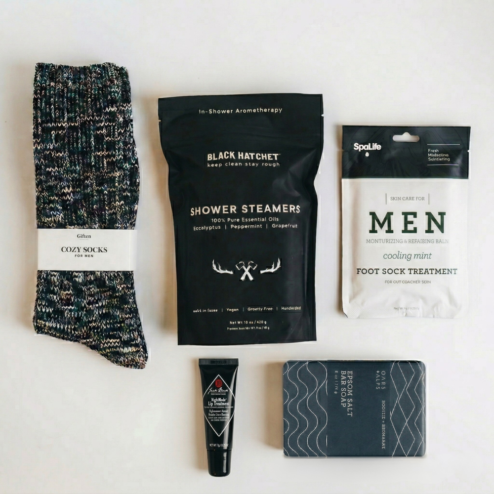 Men’s gift box with cozy socks, shower steamers, mint foot treatment, lip balm, and soap