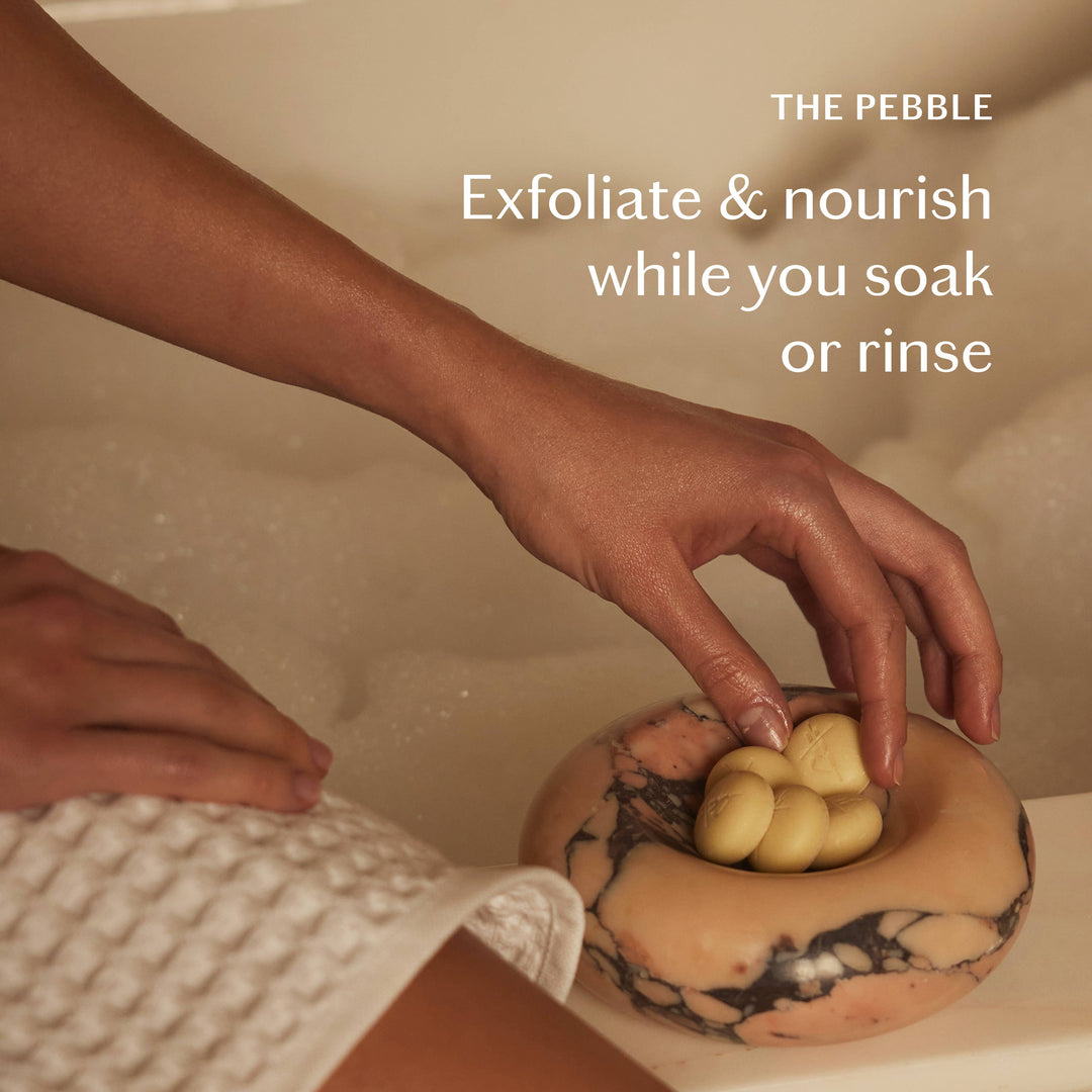 A Pebble held in a hand