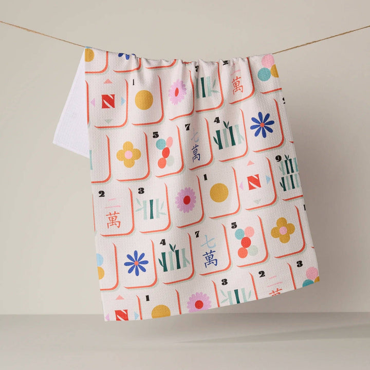 Geometry Tile Toss Tea Towel with tossed mahjong tiles print