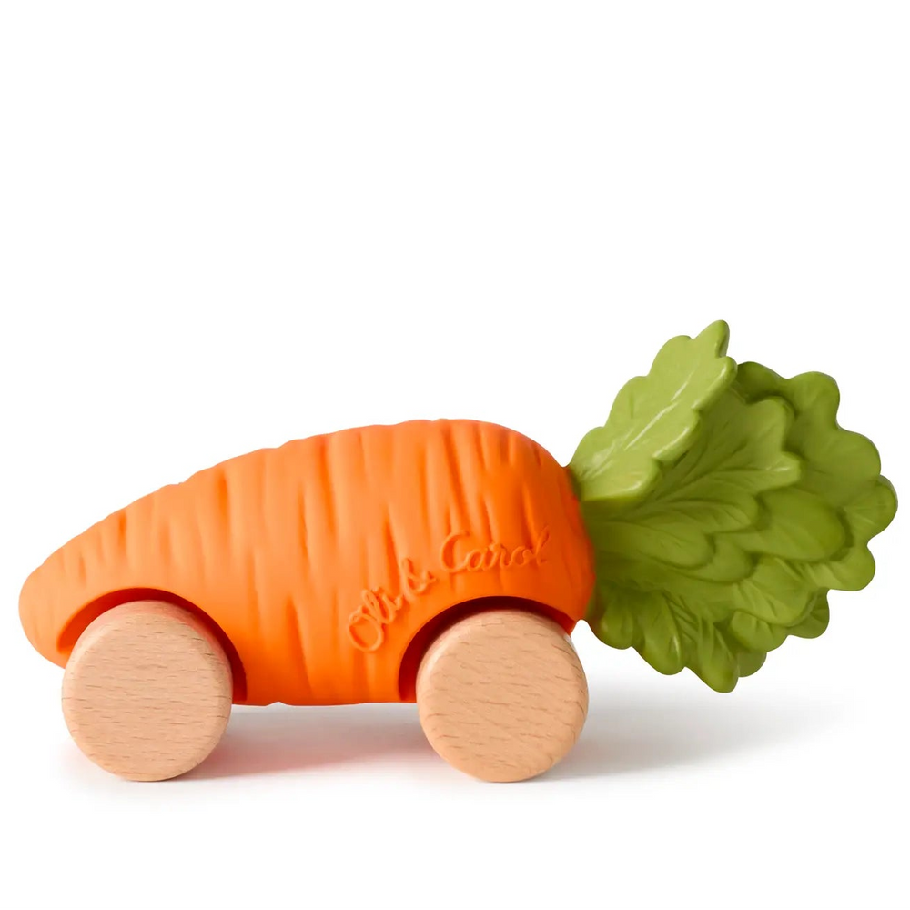 Orange natural rubber carrot car with a green leafy top and four natural wood wheels, shown from the side on a white background.