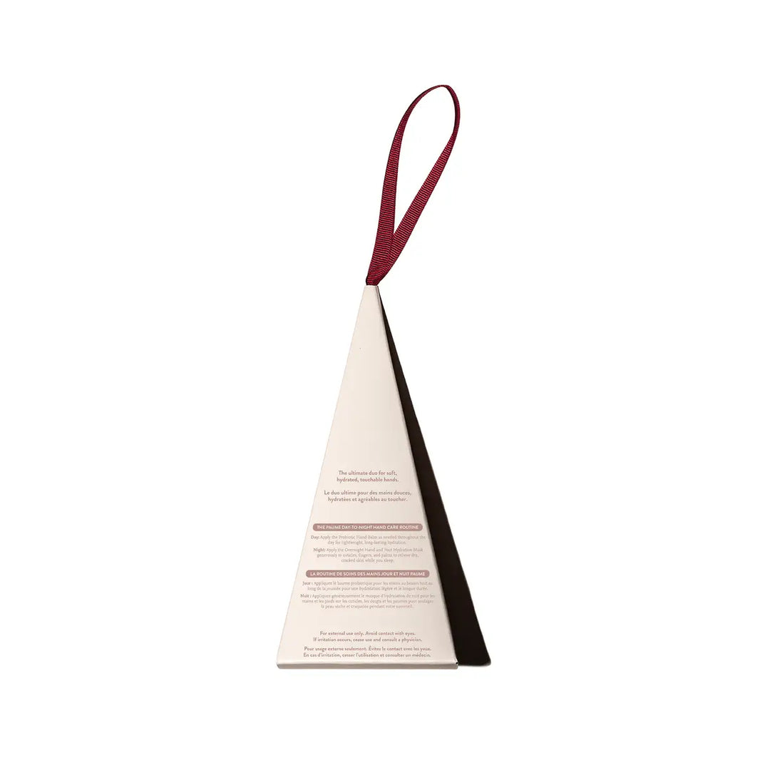 Back of the PAUME Mini Hand Care Duo ornament box, printed with the day and night hand care routine in English and French.