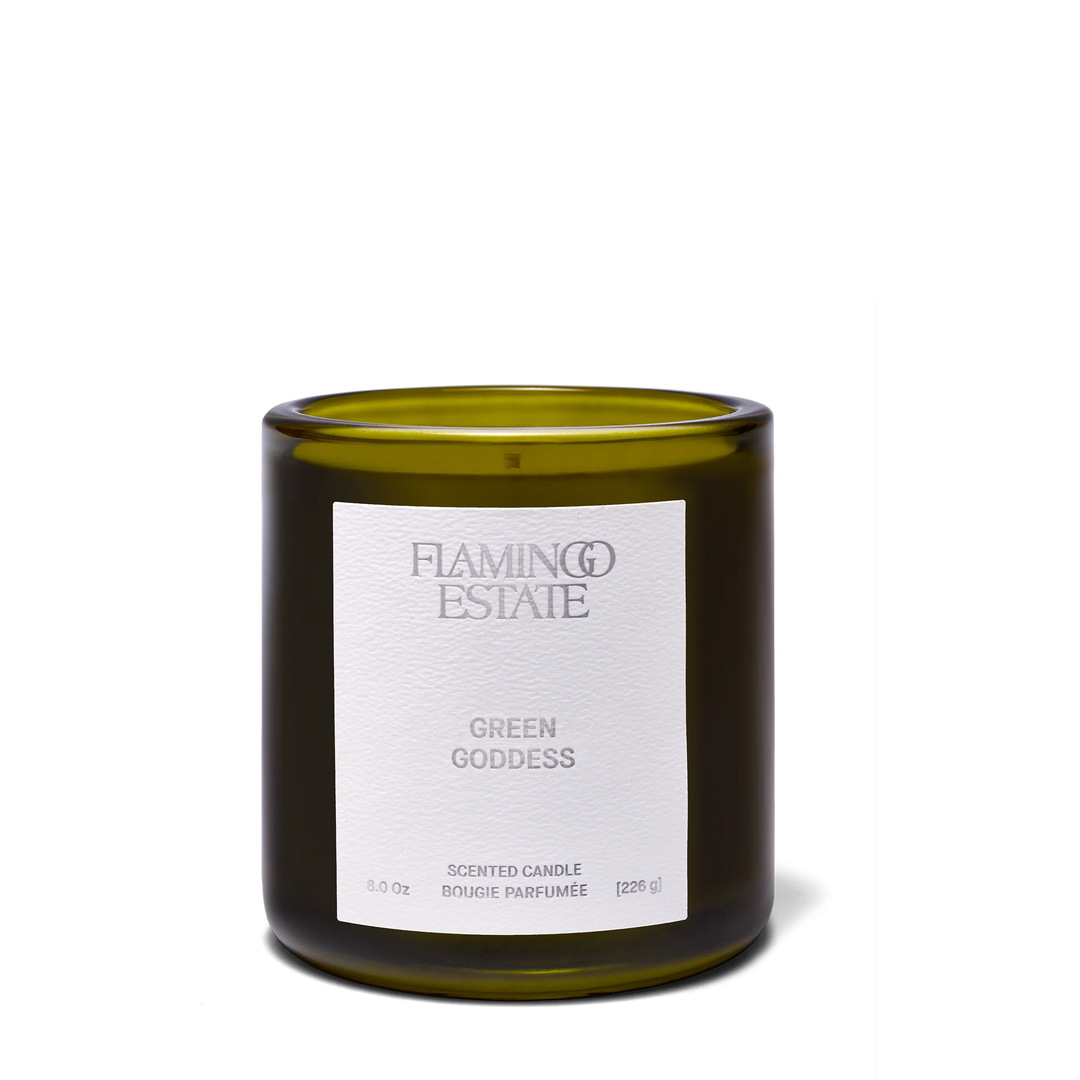 Green Goddess candle in a deep olive glass vessel with a white Flamingo Estate label, front view, 8 oz
