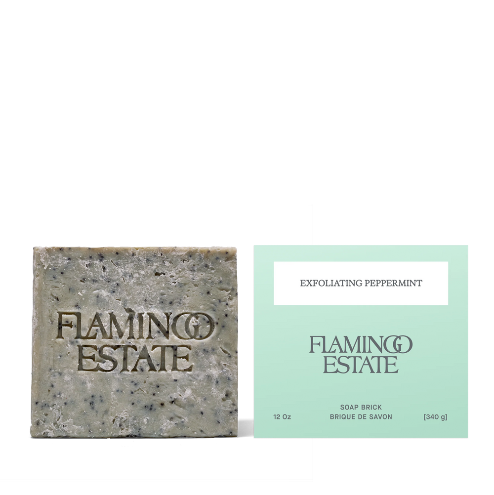 The soap brick beside its mint green carton, printed Exfoliating Peppermint, Flamingo Estate, Soap Brick, 12 Oz