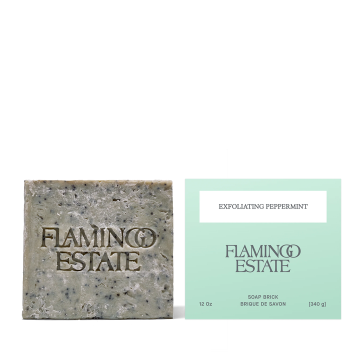 The soap brick beside its mint green carton, printed Exfoliating Peppermint, Flamingo Estate, Soap Brick, 12 Oz