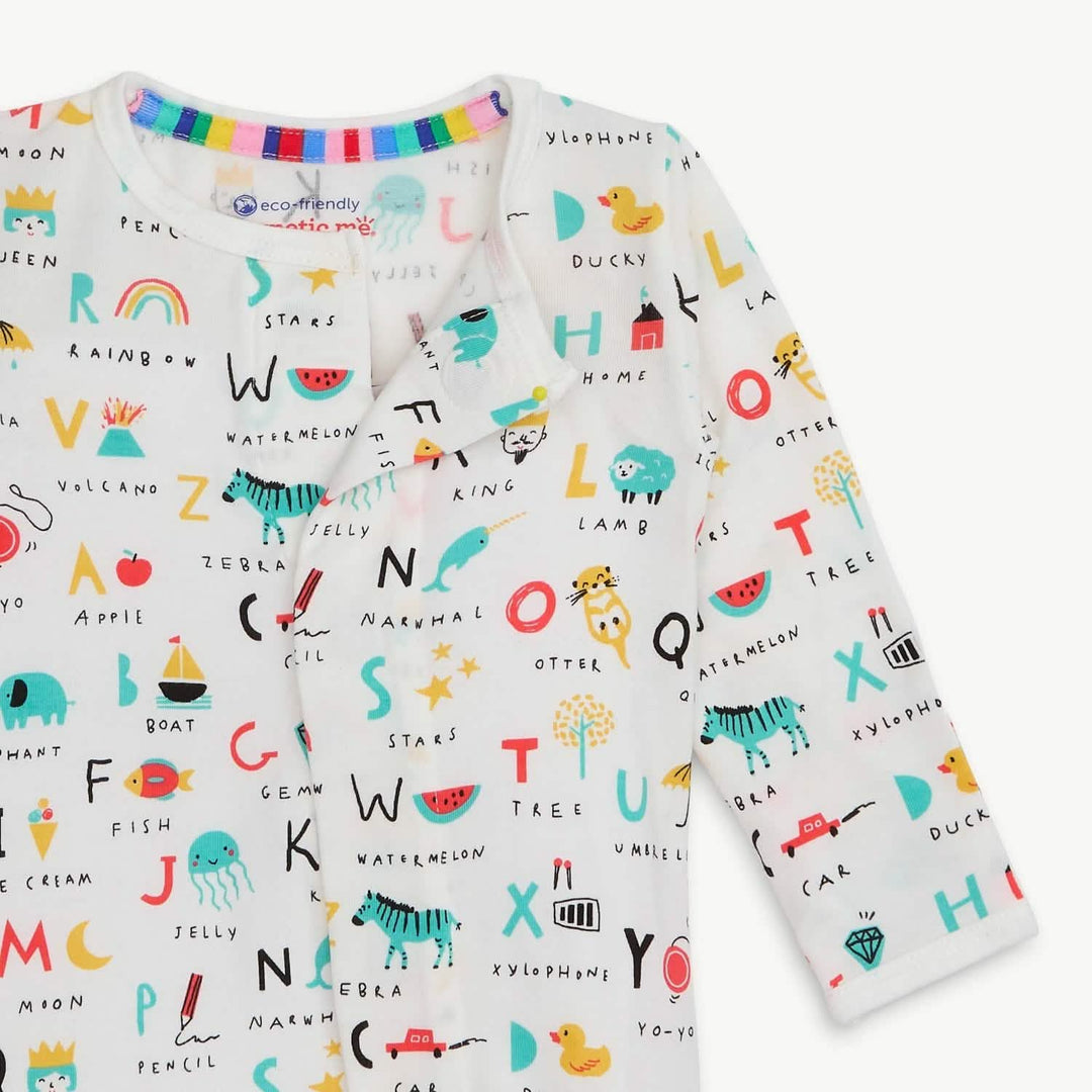 Alphabet print baby footie pajamas with colorful letters and playful illustrations
