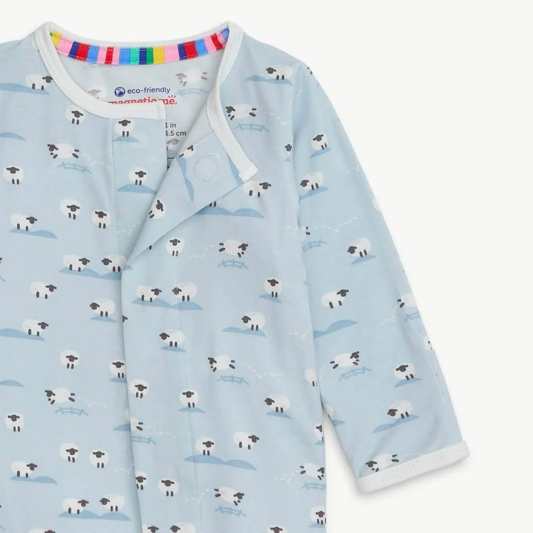 Light blue baby footie sleeper with sheep print and snap closure