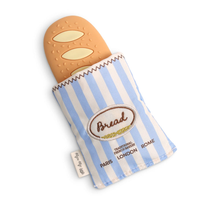 Baguette-shaped baby toy in blue and white striped fabric pouch with embroidered bread label