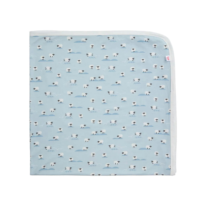 Light blue baby blanket featuring a sheep pattern and white trim, displayed flat.