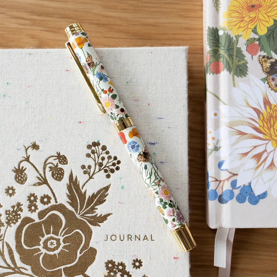 Botanist Rollerball Pen with botanical pattern, stainless steel body, brass accents, and gift box.