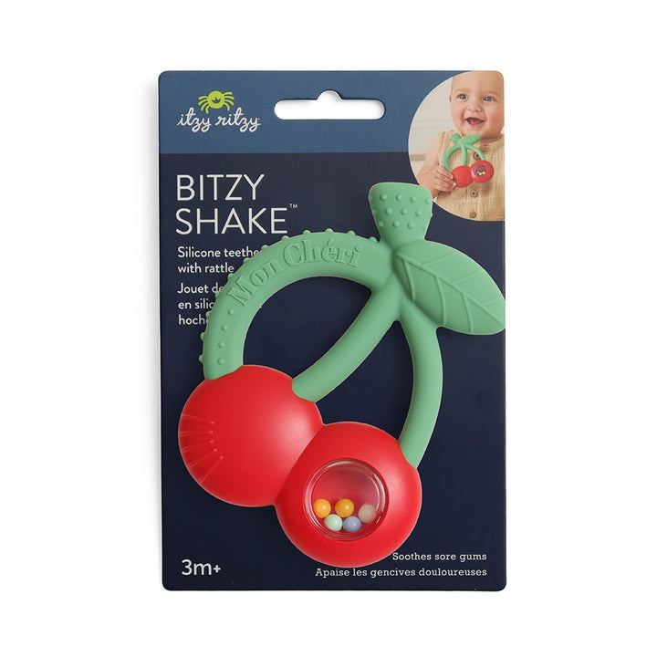 Cherry-shaped silicone baby teether with rattle in retail packaging