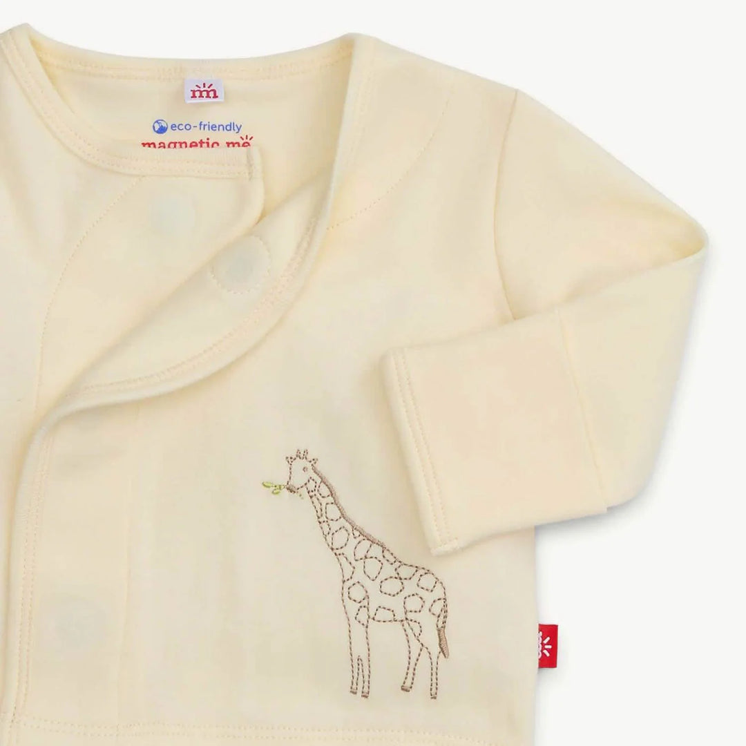 Cream baby onesie with embroidered giraffe design and snap closure, folded sleeves visible