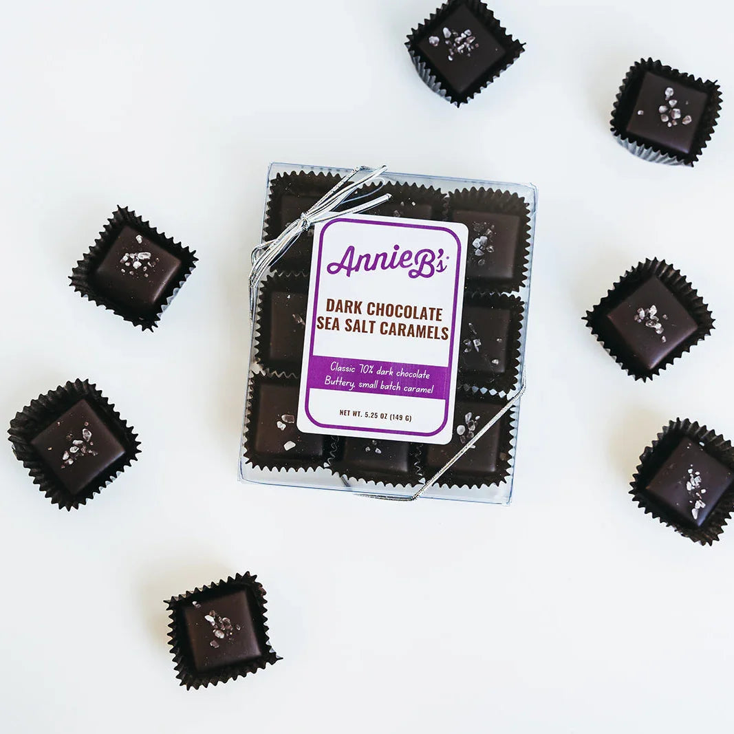 Pack of Annies dark chocolate sea salt caramels on a white background