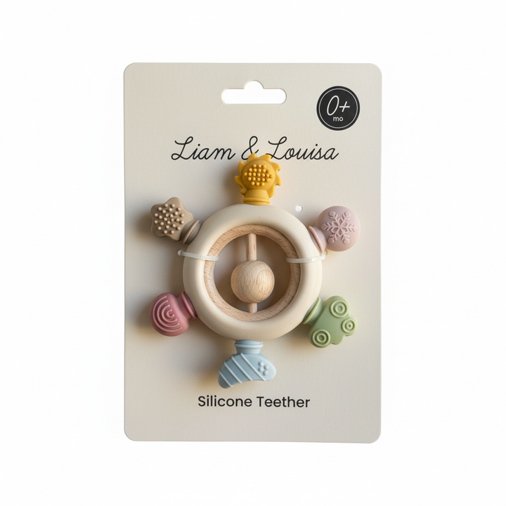 Silicone teether with colorful designs on a Liam & Louisa packaging