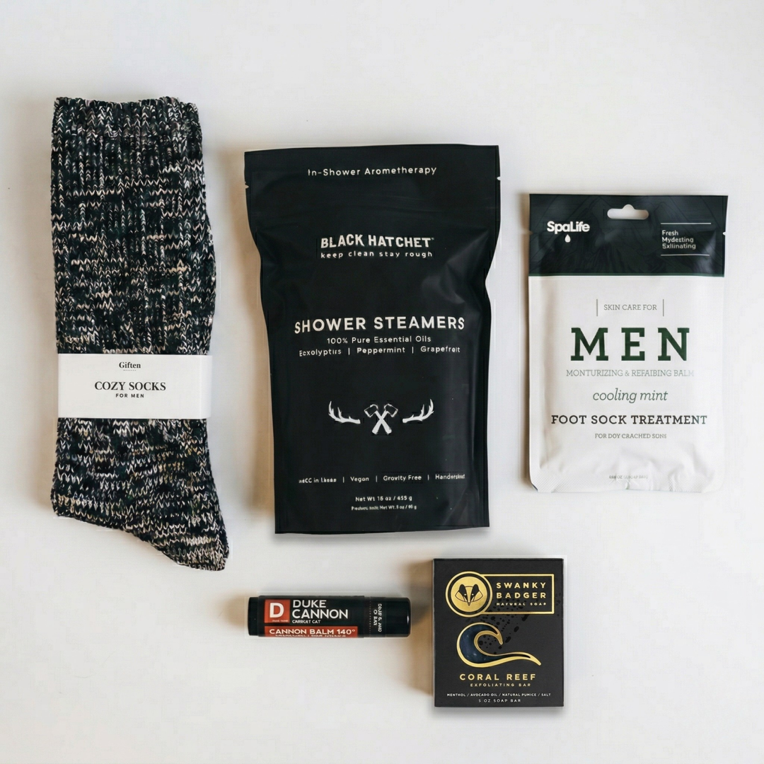 Men’s self-care gift box with cozy socks, shower steamers, foot treatment, balm, and soap