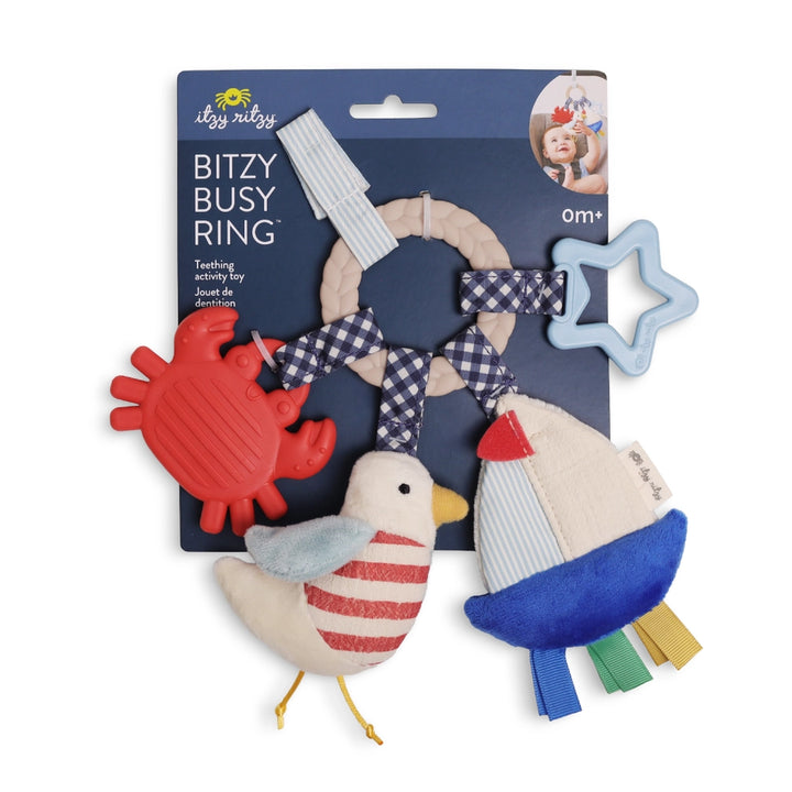 Nautical-themed baby activity toy with plush bird, crab teether, sailboat, and star ring