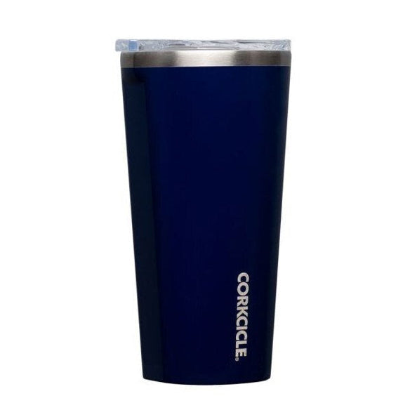 Blue tumbler with silver lid on a white background