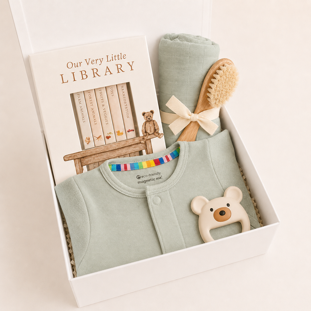 Sweet Beginnings Baby Gift Box in Sea Foam: sage footie, Our Very Little Library, sage swaddle, wooden brush and bear teether
