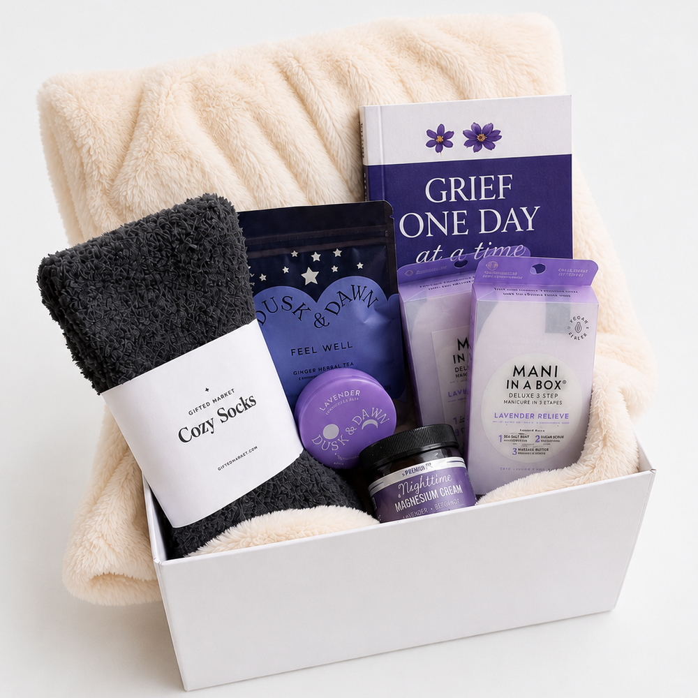 Gift set with Cozy Socks, Mani in a Box, and other items on a white background