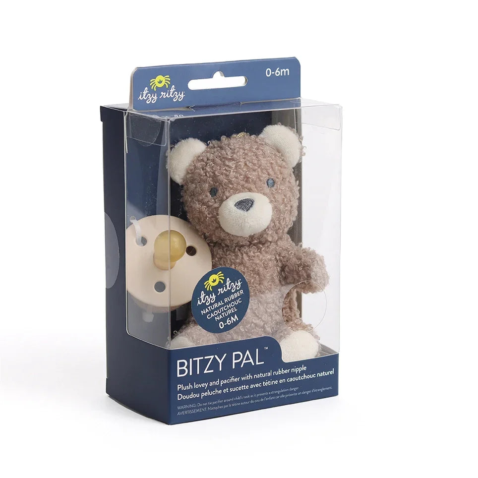 Plush bear and natural rubber pacifier set for babies in clear retail packaging