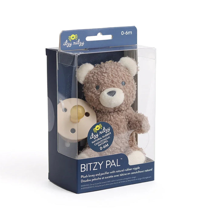 Plush bear and natural rubber pacifier set for babies in clear retail packaging