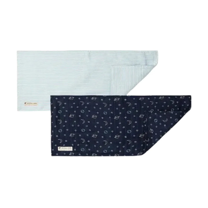 Two muslin baby burp cloths, one blue striped and one navy with space-themed print