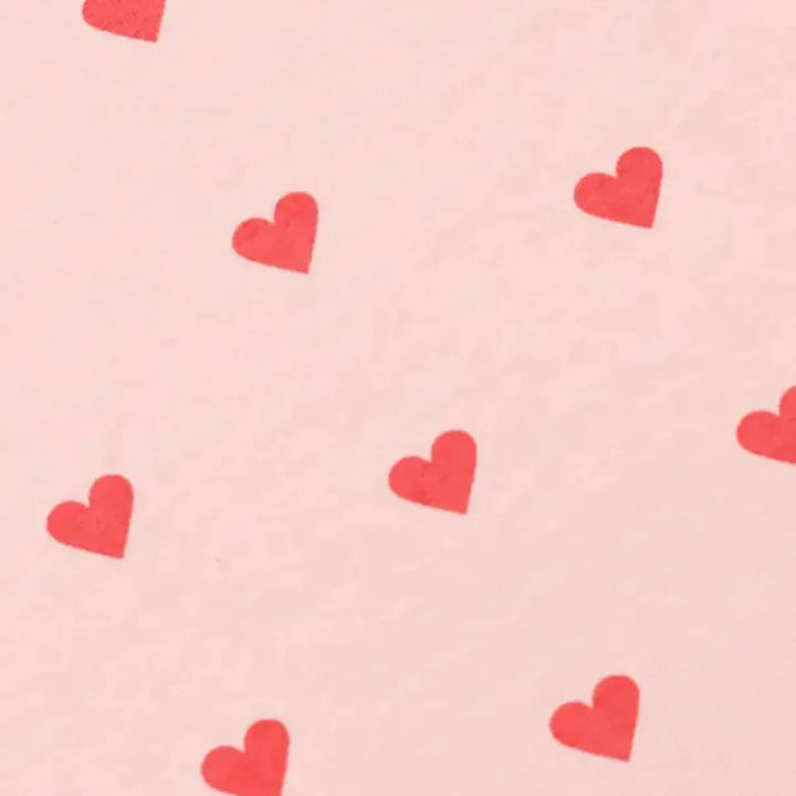 Soft pink baby blanket with red heart pattern, ideal for newborn gifting