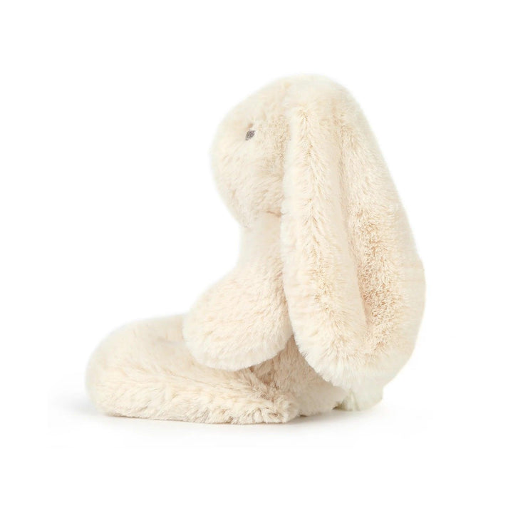 Plush cream bunny soft toy with floppy ears, seated on a white background