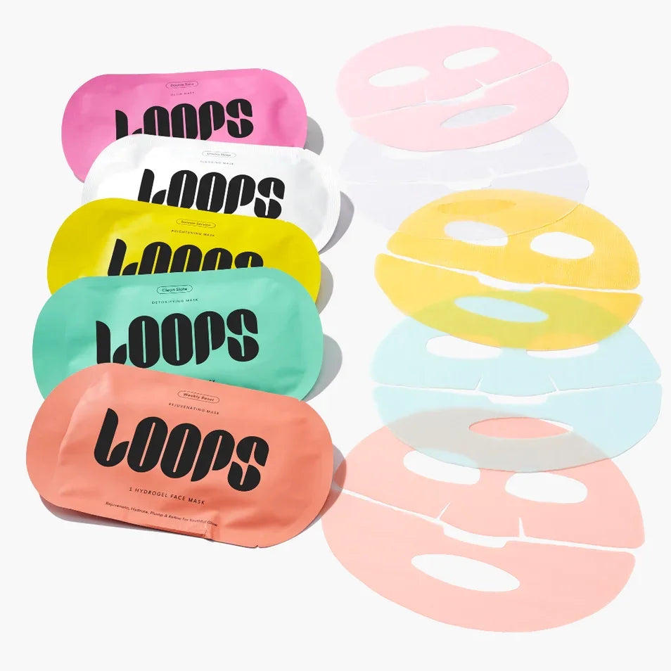 Variety pack of colorful Loops sheet masks with coordinating hydrogel face masks displayed flat.