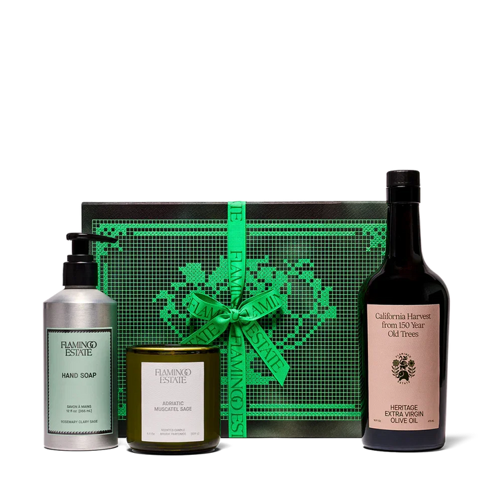 Gift set with green ribbon, hand soap, muscatel sage candle, and olive oil bottle