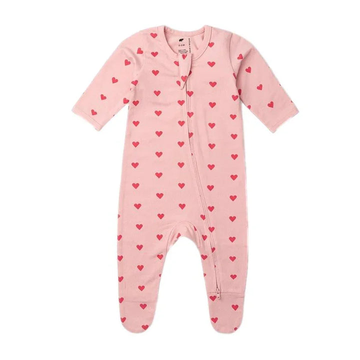 Pink baby footed pajamas with red heart pattern and front zipper closure
