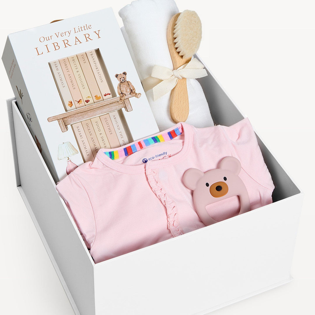 Sweet Beginnings Baby Gift Box Pink Ruffle, close-up of the open gift box. Giften Market.