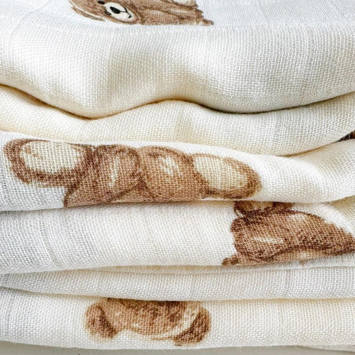 Folded bamboo muslin baby swaddle with brown teddy bear print